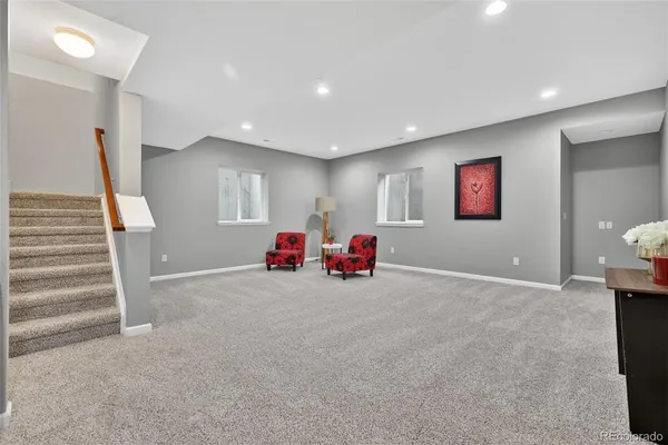 a living room with furniture and a couch