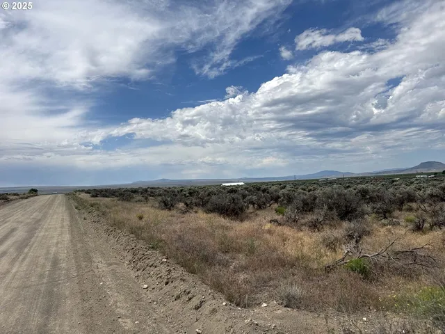 a view of a lake and mountain in back