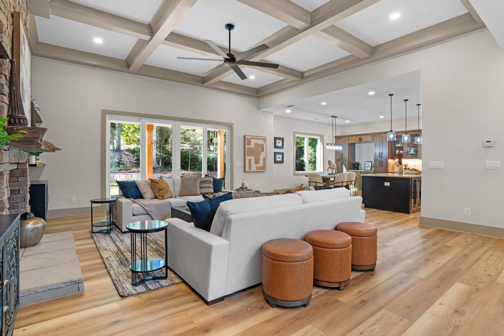4611 Medlock Bridge Road Peachtree Corners, GA 30097 - Photo 6 of 36 a living room with furniture and a large window