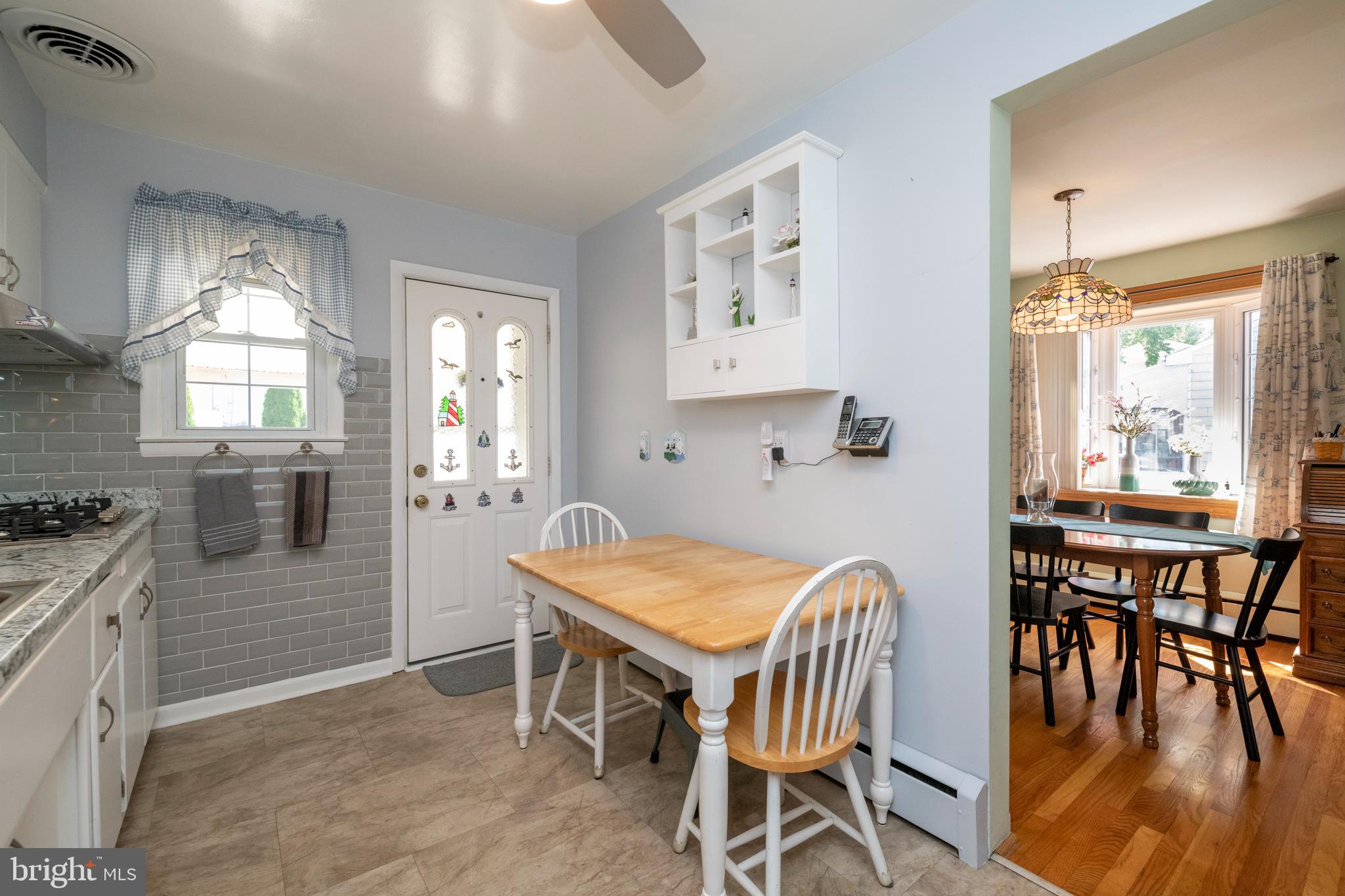 8209 Old Philadelphia Road Rosedale, MD 21237 - Photo 12 of 35 Kitchen has access to rear patio