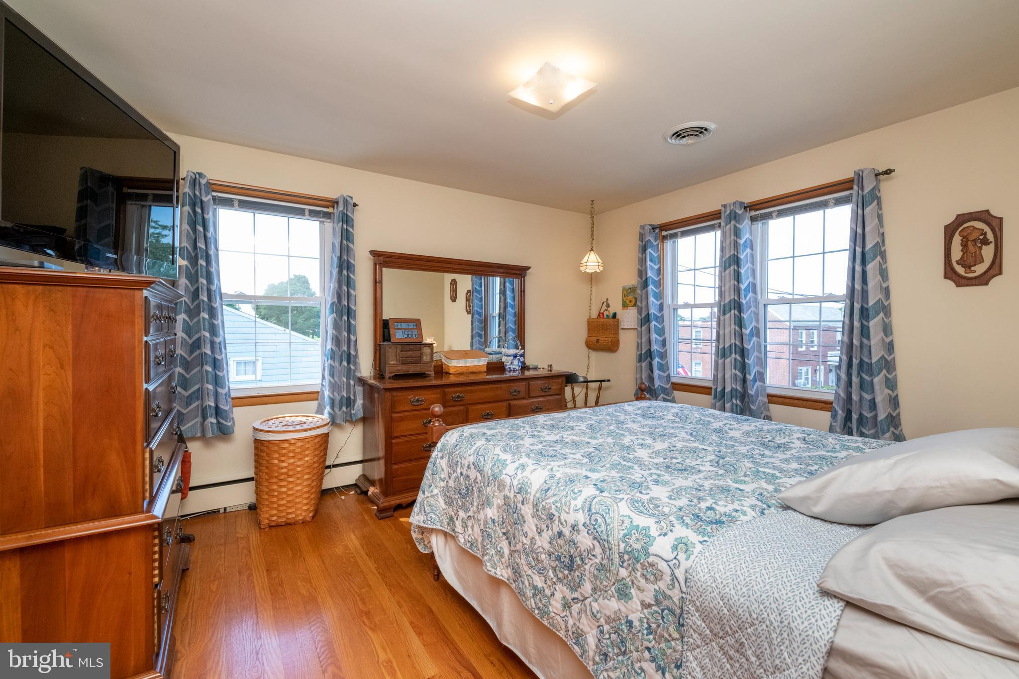 8209 Old Philadelphia Road Rosedale, MD 21237 - Photo 14 of 35 Primary bedroom with hardwood floors