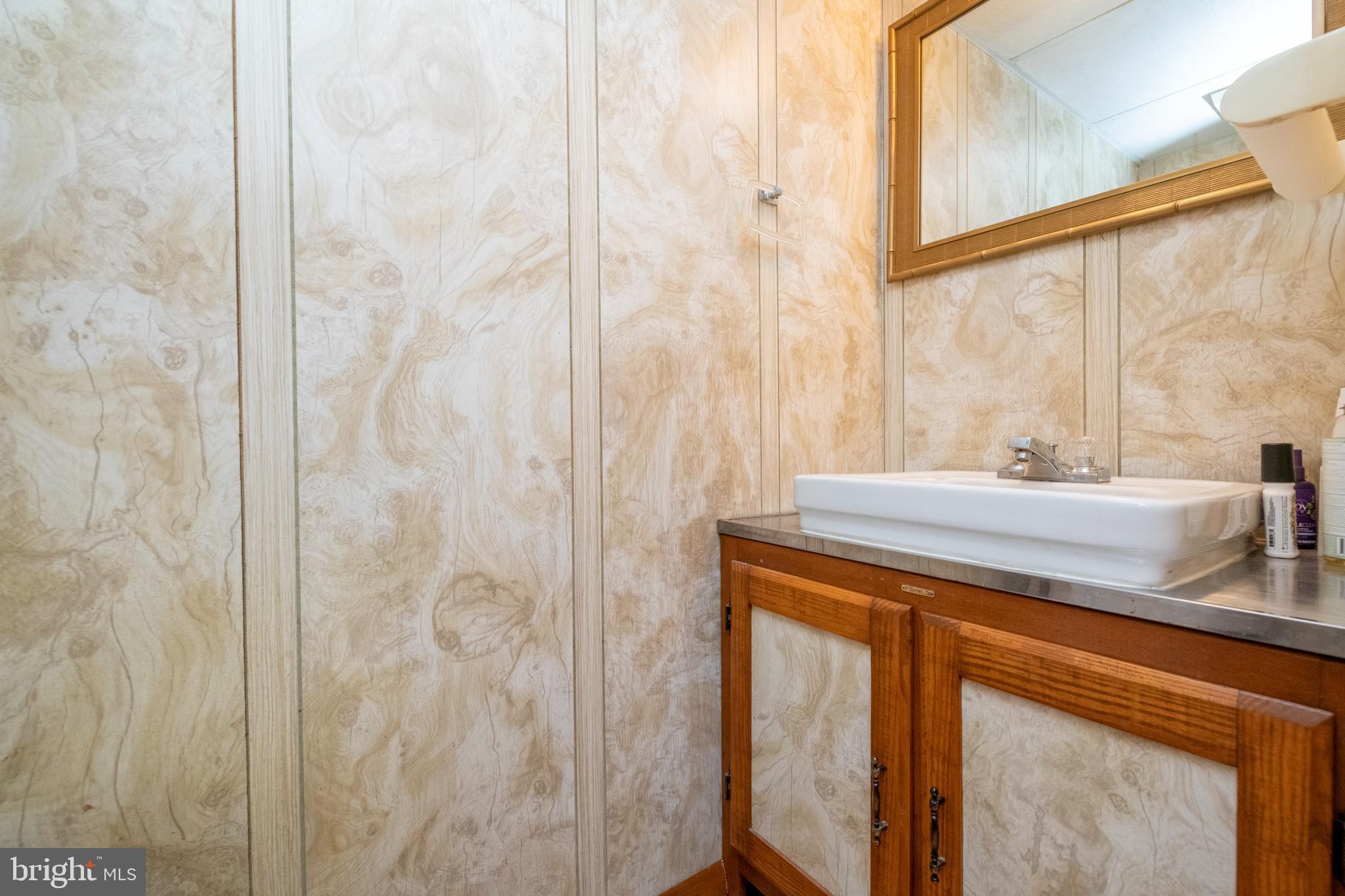 8209 Old Philadelphia Road Rosedale, MD 21237 - Photo 25 of 35 Lower level half bath