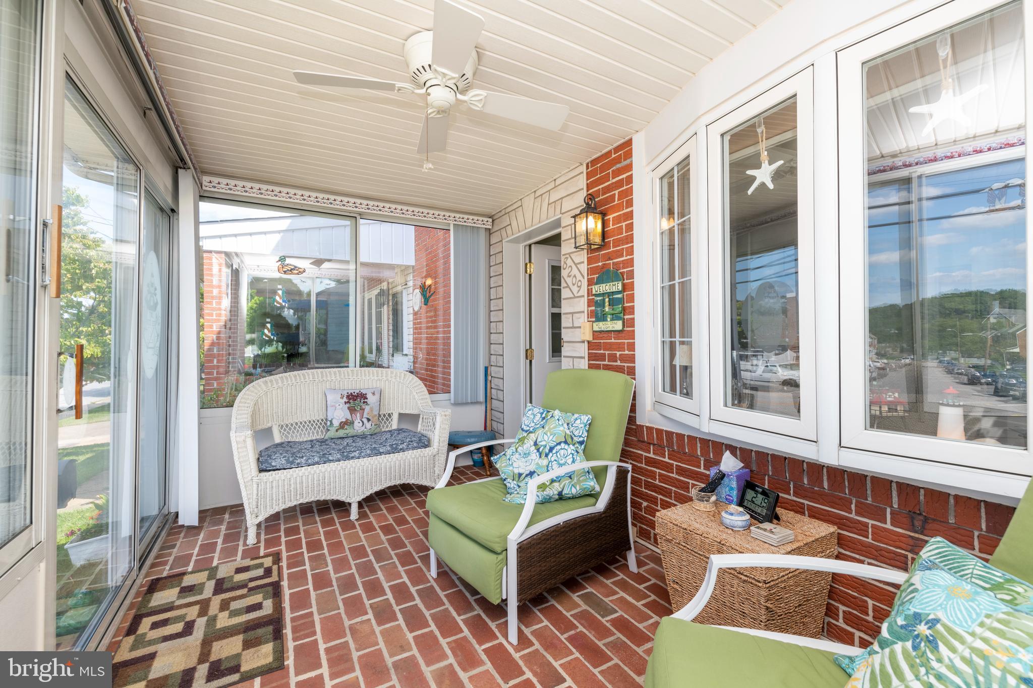8209 Old Philadelphia Road Rosedale, MD 21237 - Photo 3 of 35 Bright & sunny enclosed front porch