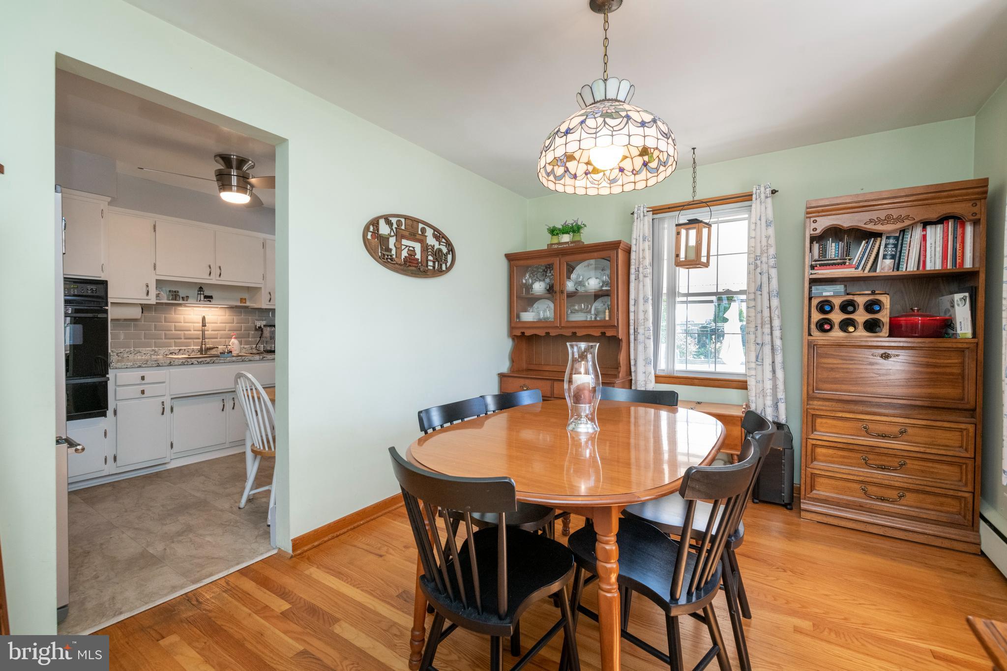 8209 Old Philadelphia Road Rosedale, MD 21237 - Photo 10 of 35 Dining room opens into kitchen