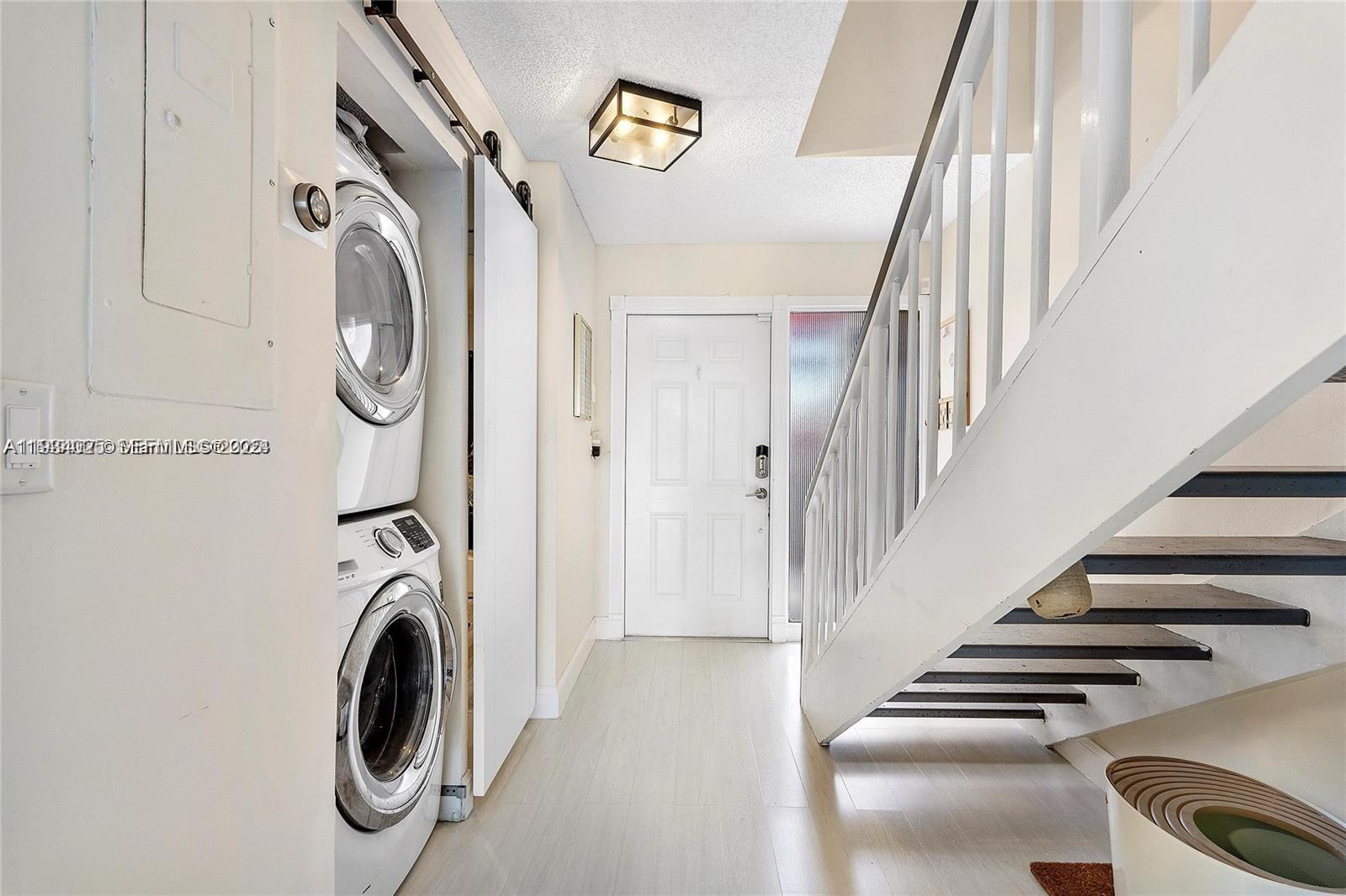 1281 West Fairway Road Pembroke Pines, FL 33026 - Photo 14 of 29 a view of entryway with washer and dryer