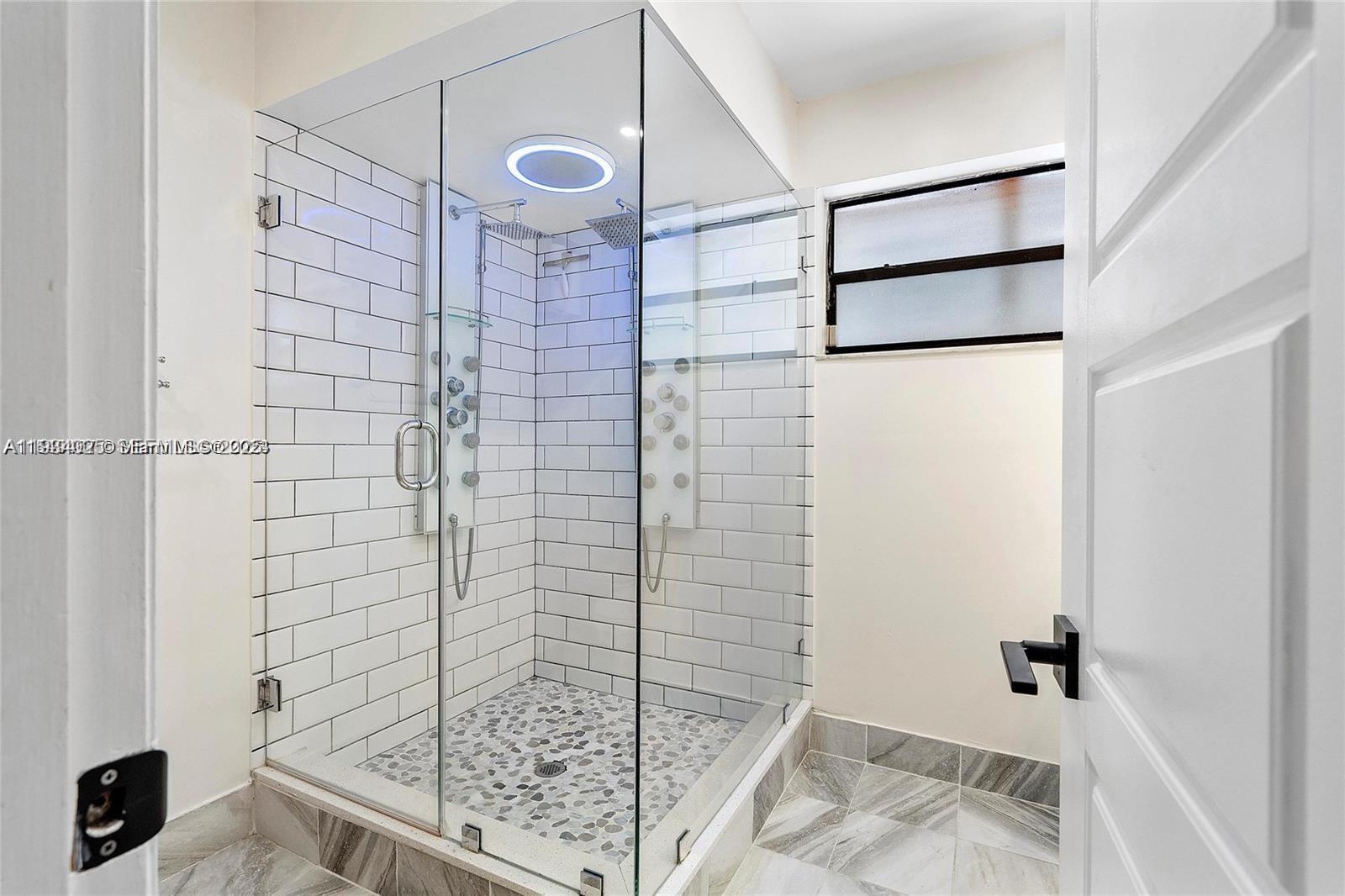 1281 West Fairway Road Pembroke Pines, FL 33026 - Photo 16 of 29 a bathroom with a shower and a sink