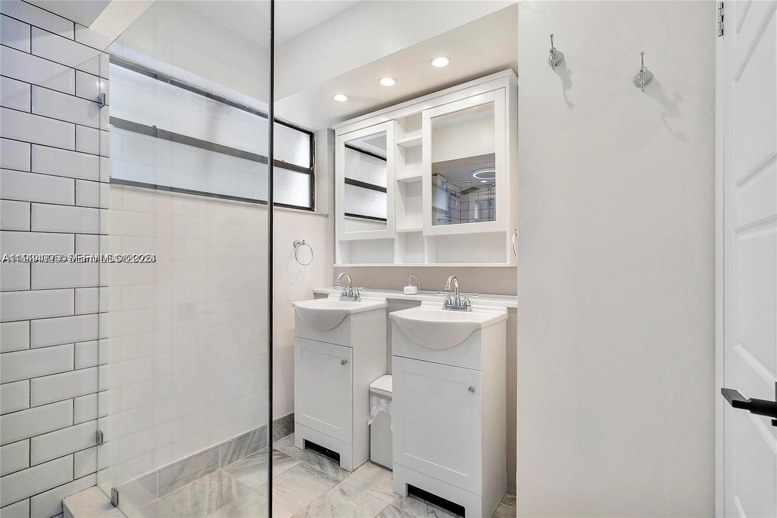 1281 West Fairway Road Pembroke Pines, FL 33026 - Photo 18 of 29 a room with a sink and cabinets