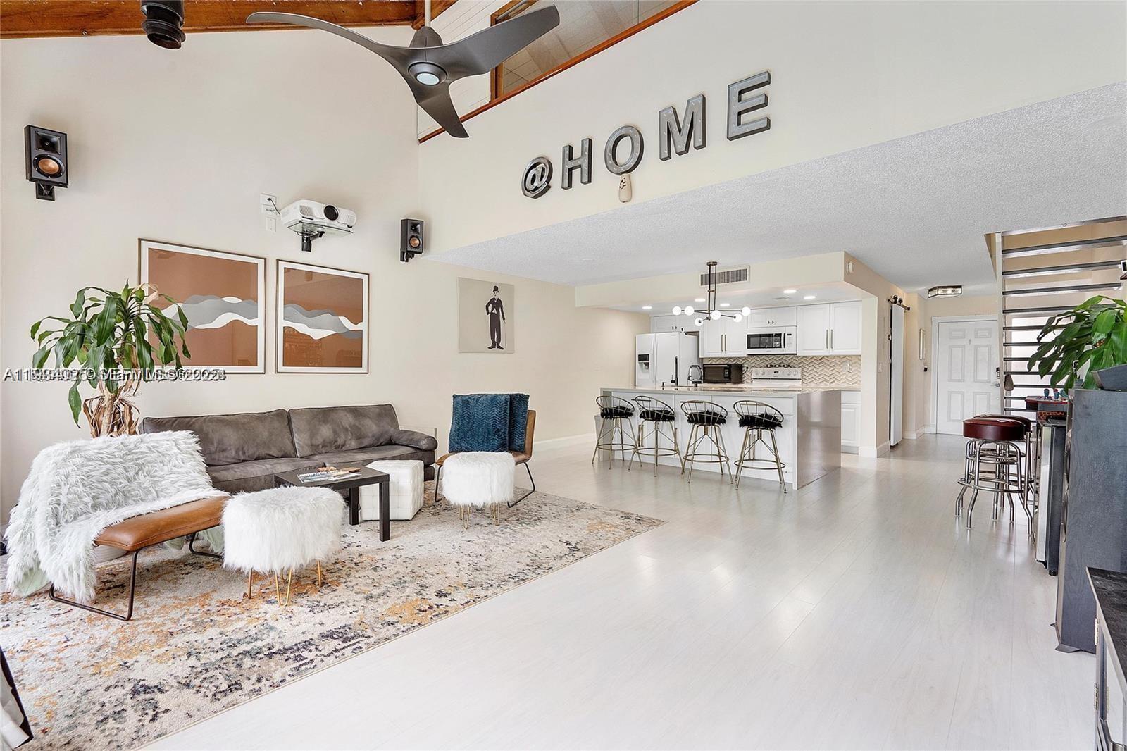 1281 West Fairway Road Pembroke Pines, FL 33026 - Photo 5 of 29 a living room with furniture and wooden floor