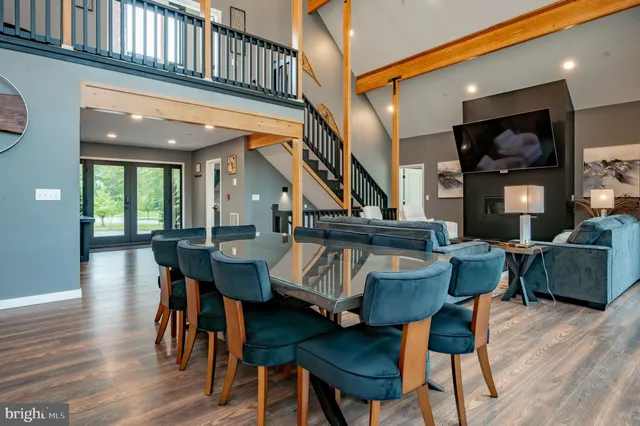a bathroom with a toilet a sink and a mirror