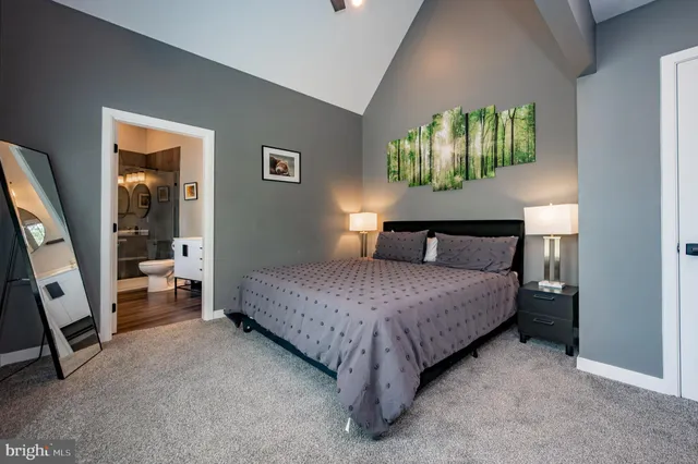 a bedroom with a bed and a closet