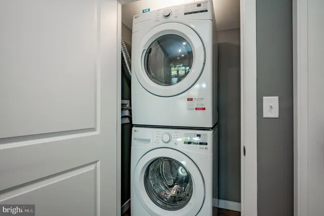 a view of a patio with table and chairs and wooden floor