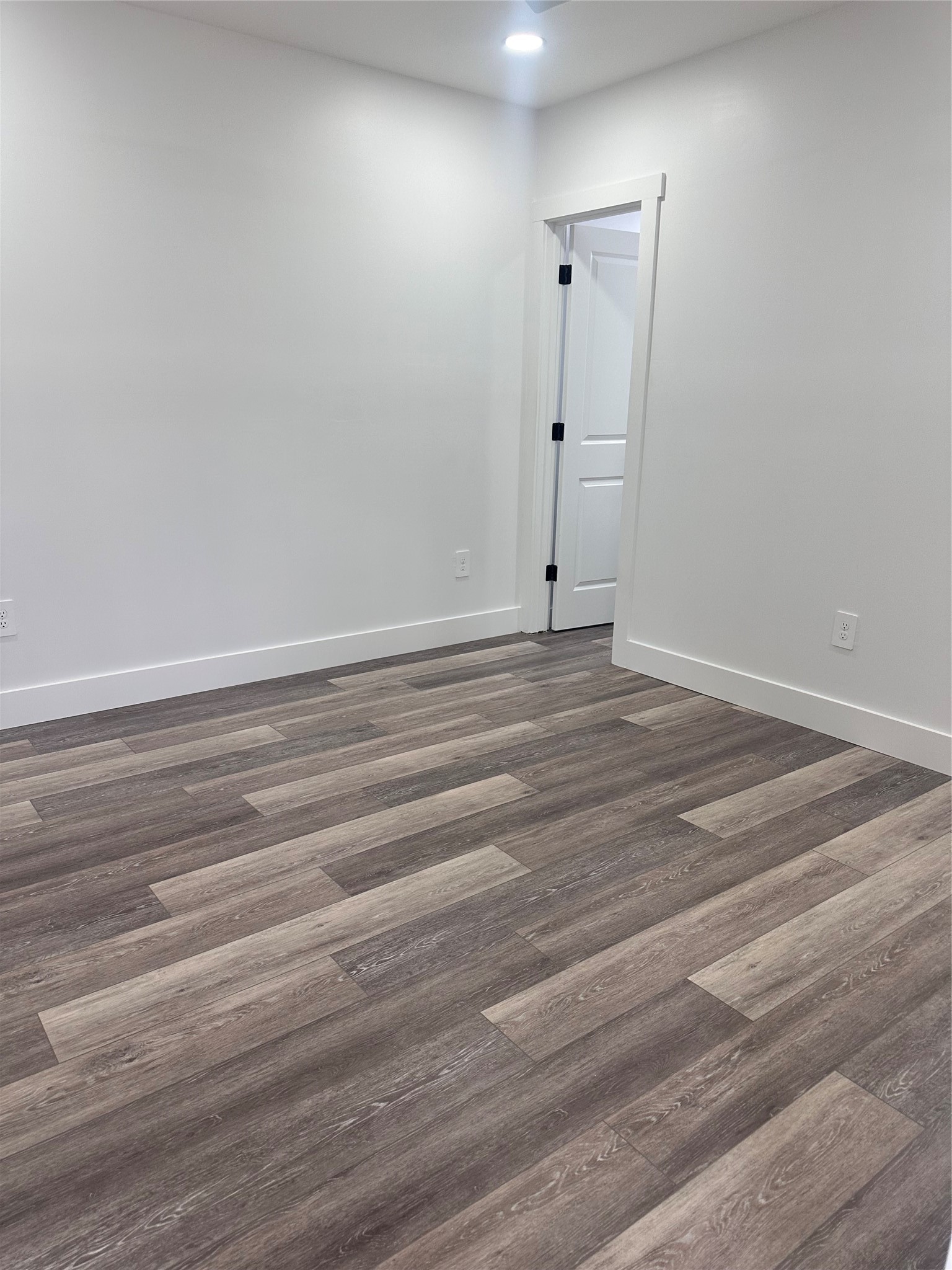 5420 Aldine Bender Road Houston, TX 77032 - Photo 12 of 13 a view of empty room with wooden floor