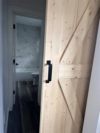 a bathroom with a sink and mirror