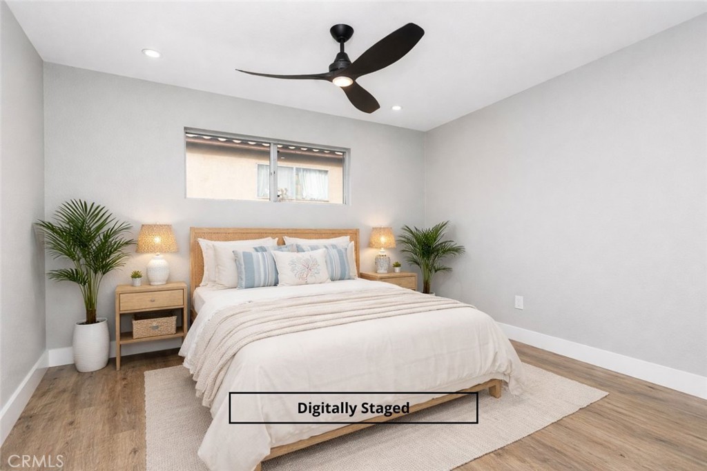 31377 Los Rios Street, Unit 64F San Juan Capistrano, CA 92675 - Photo 19 of 61 a bedroom with a bed and a potted plant