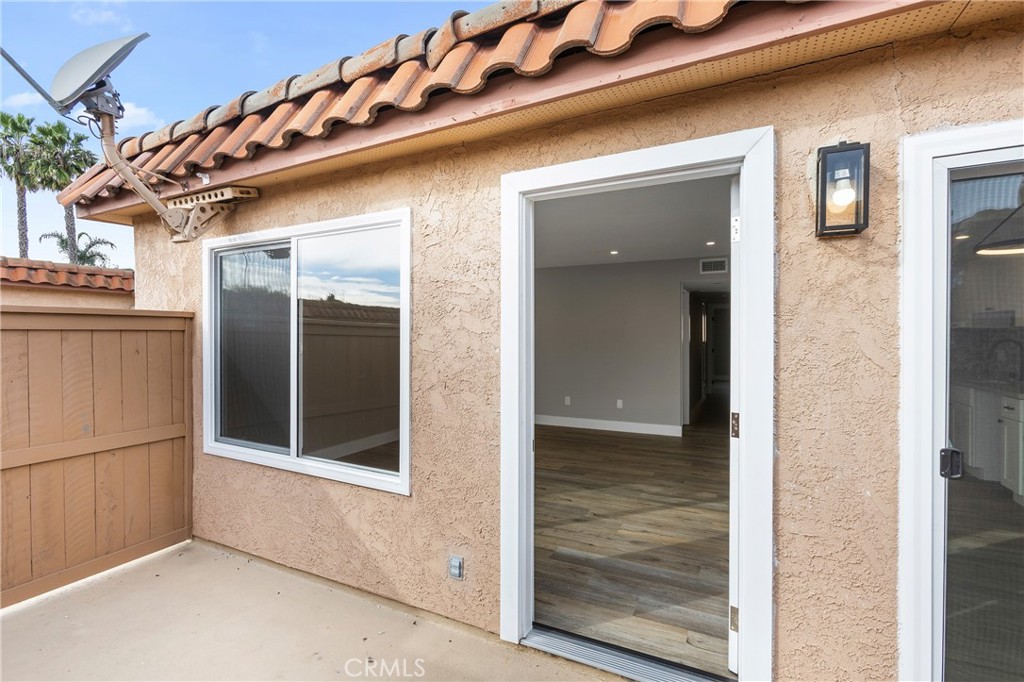 31377 Los Rios Street, Unit 64F San Juan Capistrano, CA 92675 - Photo 26 of 61 a view of a porch with a door