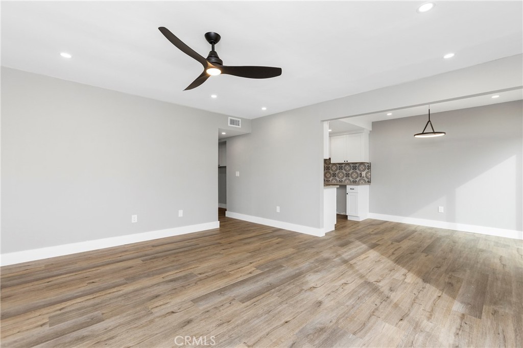 31377 Los Rios Street, Unit 64F San Juan Capistrano, CA 92675 - Photo 3 of 61 a view of empty room with wooden floor