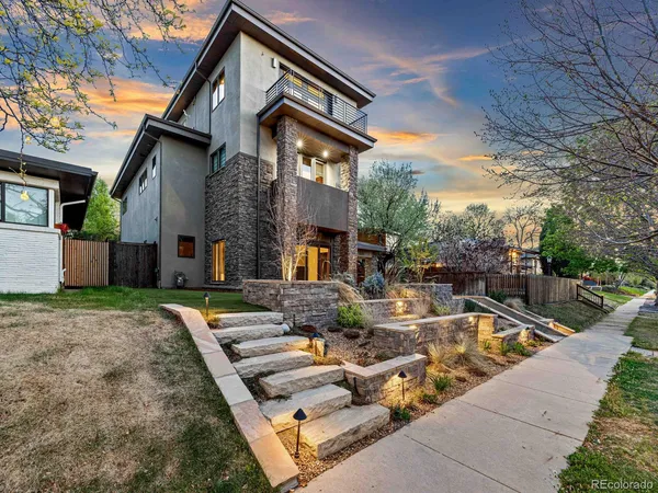 a front view of a house with entertaining space