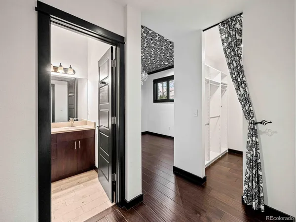 a view of white cabinets and window