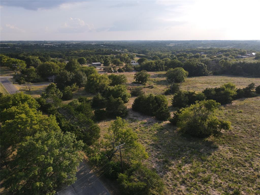 Lot 8 Webb Smith Road Sherman, TX 75090 - Photo 4 of 9 a view of a lake with mountains in the background