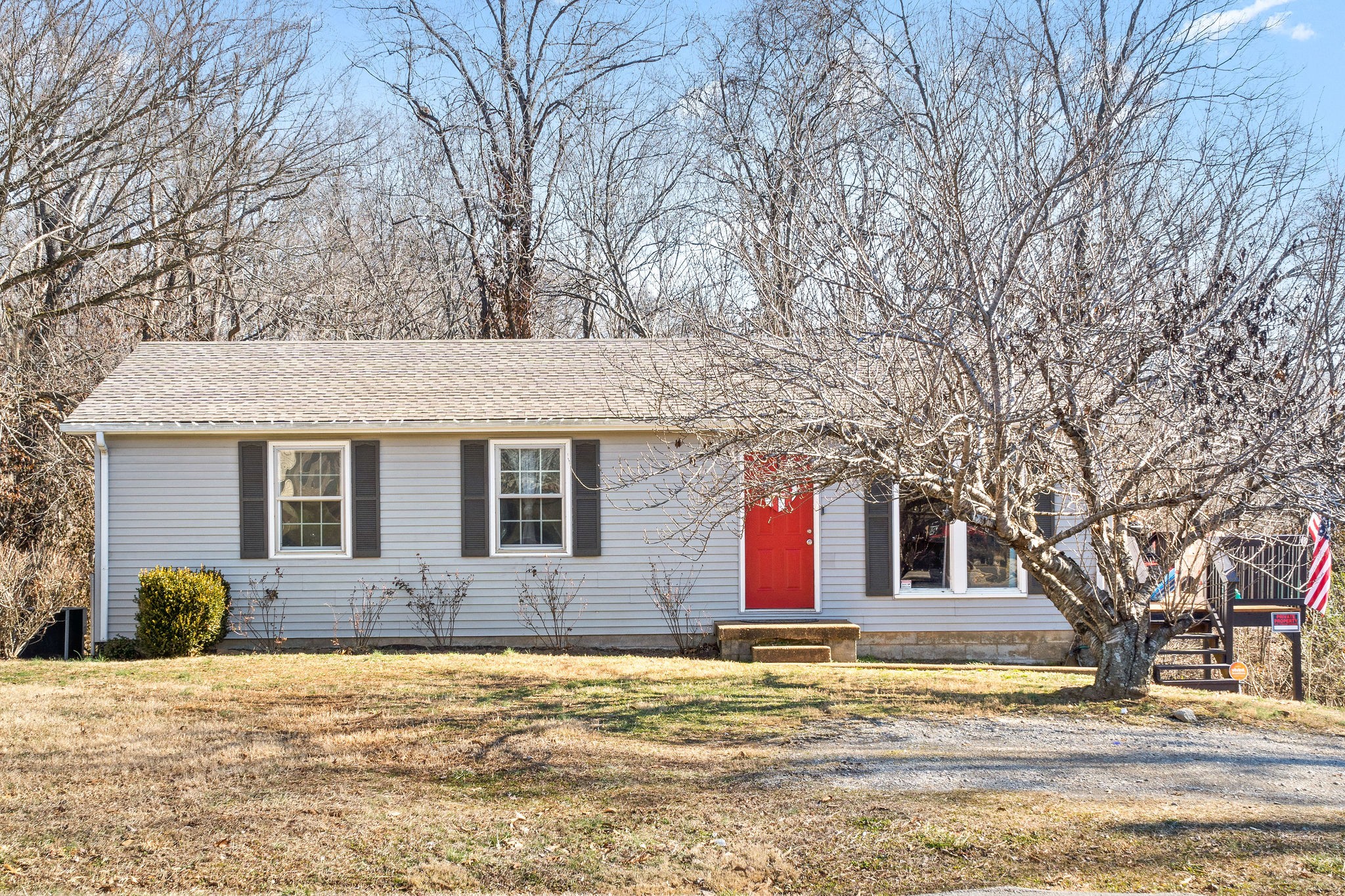 2445 Whitfield Road Clarksville, TN 37040 - Photo 1 of 29 a front view of house with yard and trees around
