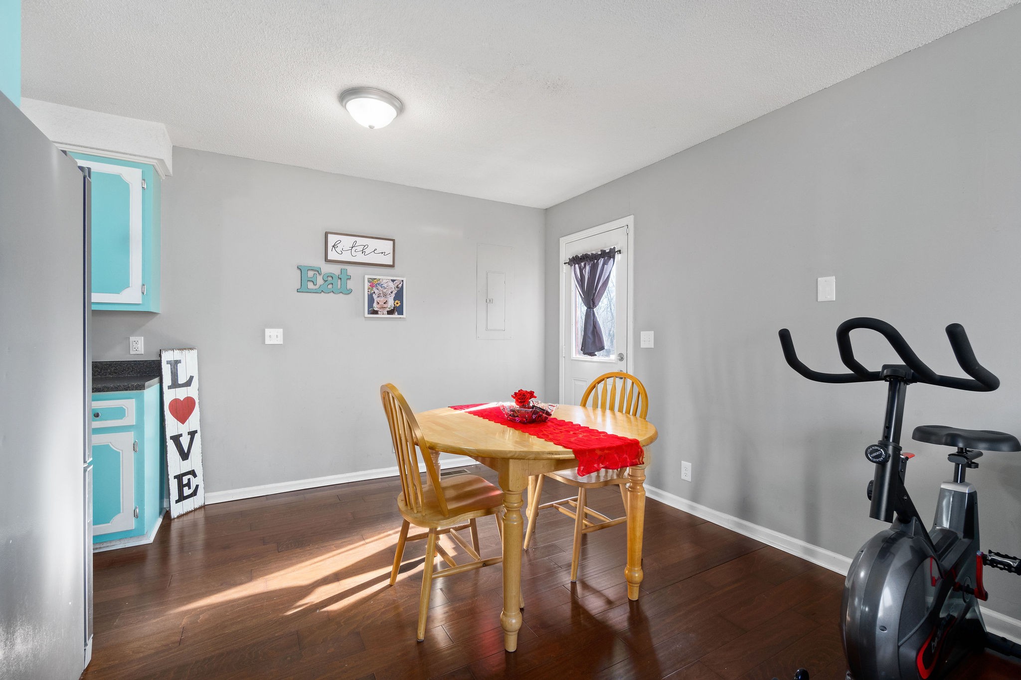 2445 Whitfield Road Clarksville, TN 37040 - Photo 15 of 29 a view of a room that has a table and chairs in it