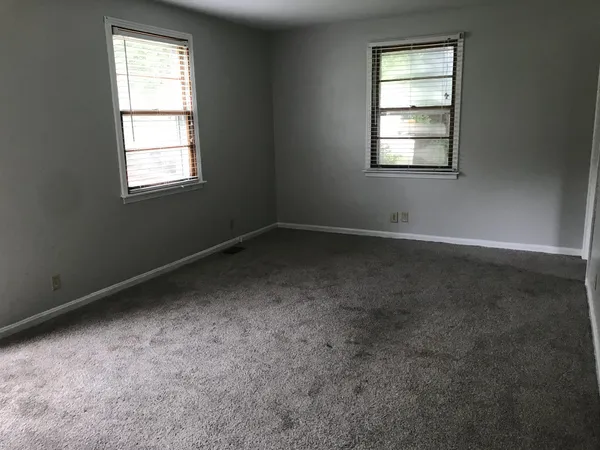 an empty room with a window