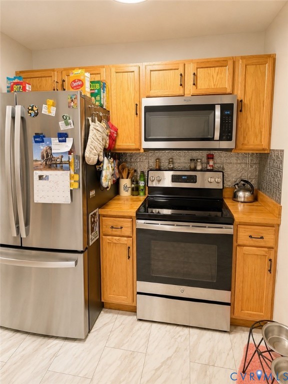 65 Cubbley Road Hot Springs, VA 24445 - Photo 22 of 50 Stainless steel refrigerator and range, wood-finis
