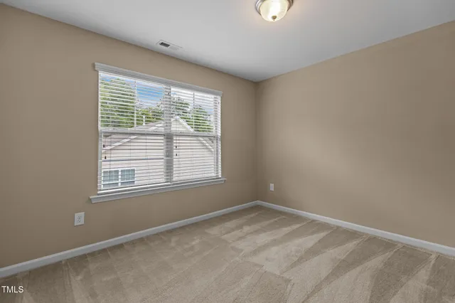 a view of a room with a window