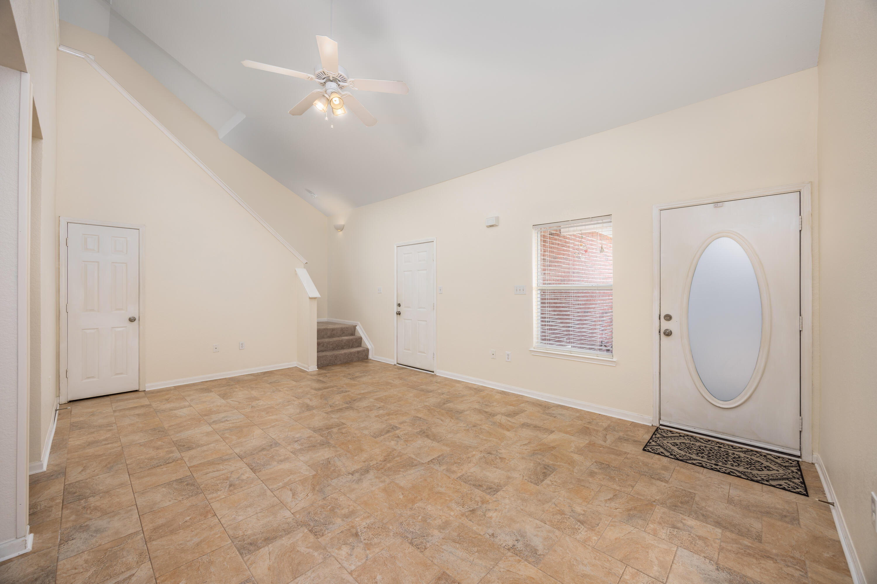 1014 Airport Road, Unit 153 Destin, FL 32541 - Photo 17 of 30 Living Room Staircase