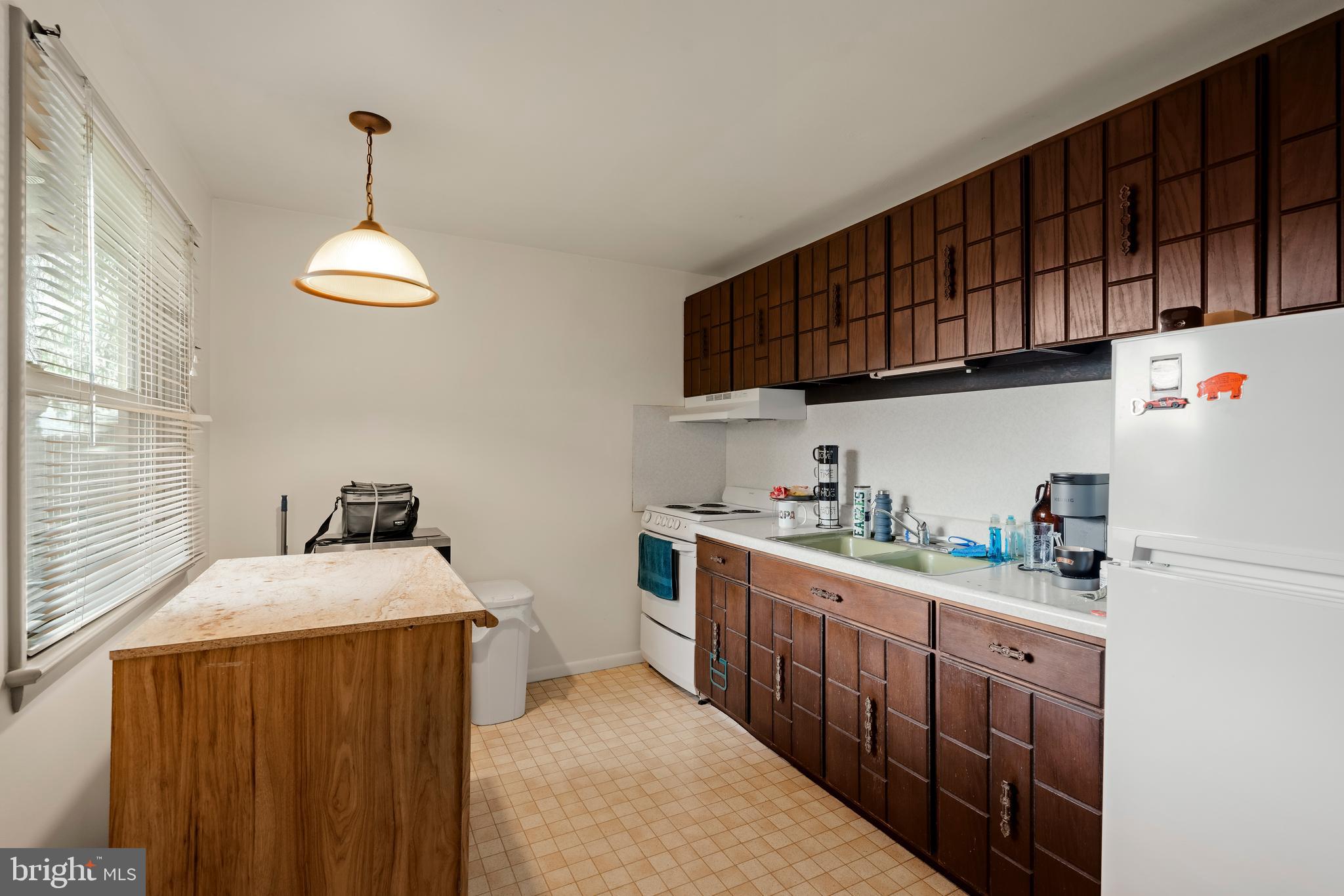 619 Millersville Road Lancaster, PA 17603 - Photo 13 of 30 a kitchen with stainless steel appliances granite countertop a sink stove and cabinets
