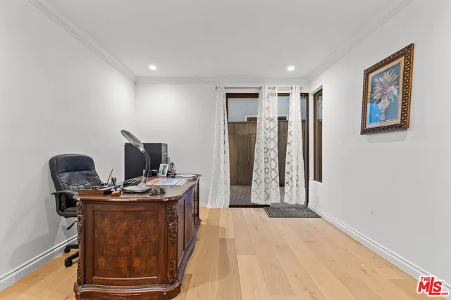 a view of a workspace with furniture