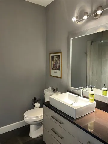 a bathroom with a sink and a toilet