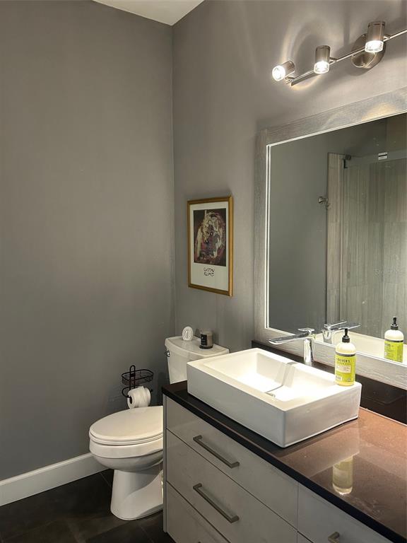 3436 Primrose Way Palm Harbor, FL 34683 - Photo 8 of 16 a bathroom with a sink and a toilet