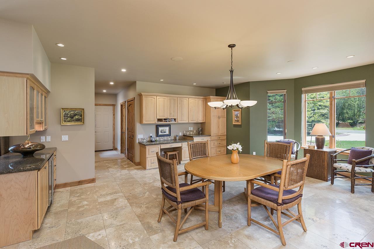 435 Red Rock Road Durango, CO 81301 - Photo 11 of 35 a dining room with furniture and window