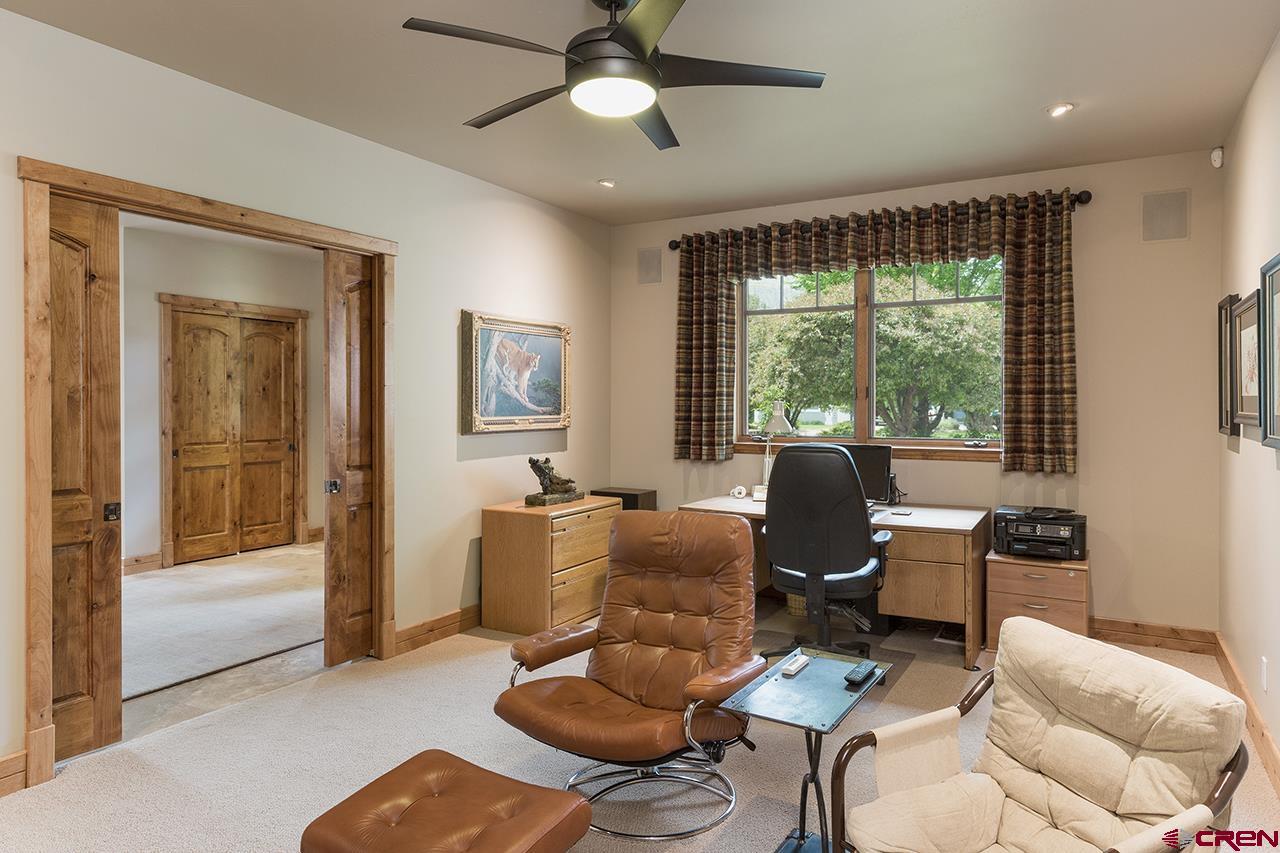 435 Red Rock Road Durango, CO 81301 - Photo 16 of 35 a work room with furniture and a window