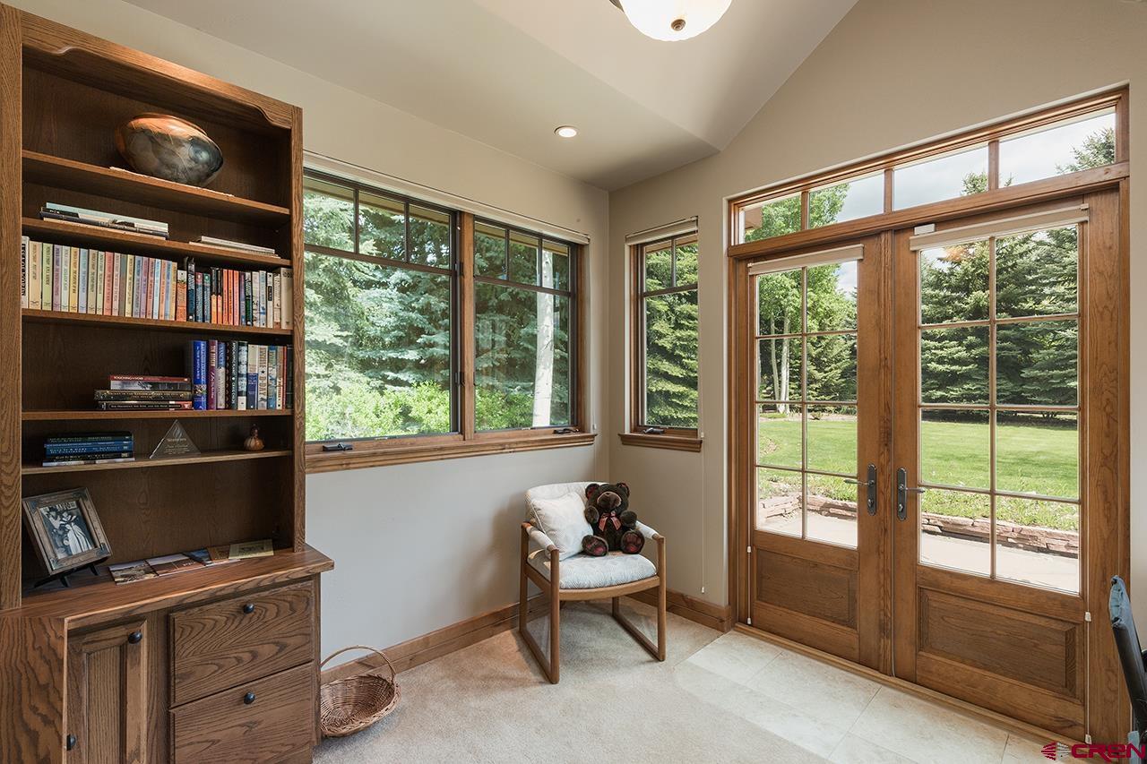 435 Red Rock Road Durango, CO 81301 - Photo 19 of 35 a living room with furniture and a window
