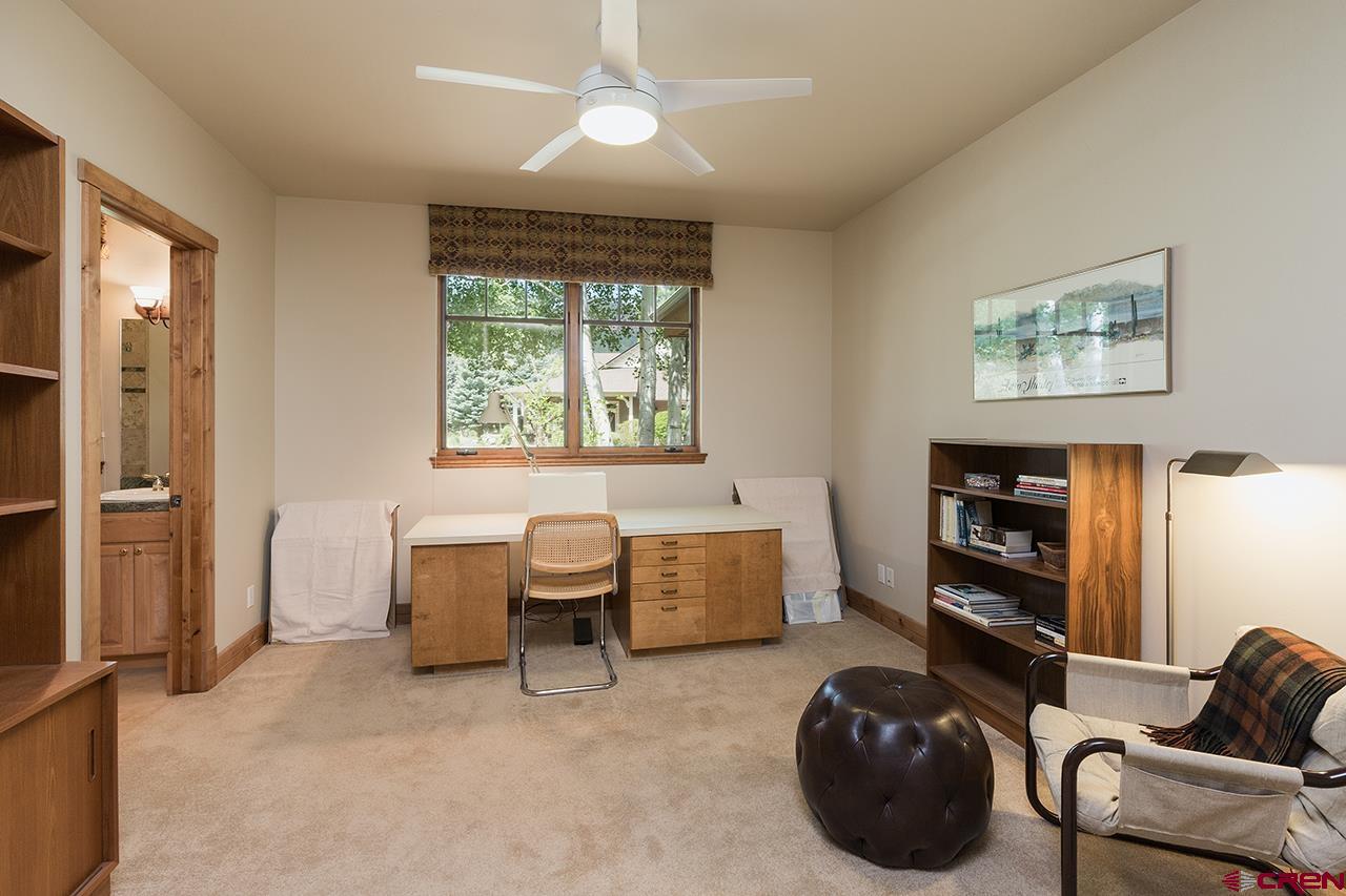 435 Red Rock Road Durango, CO 81301 - Photo 26 of 35 a bedroom with furniture and a window