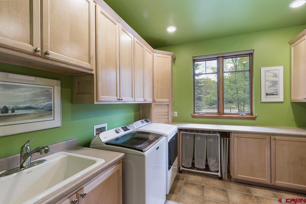 435 Red Rock Road Durango, CO 81301 - Photo 28 of 35 a view of a kitchen with sink and window