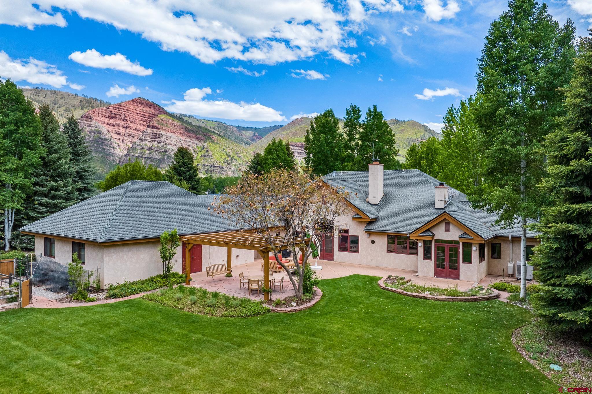 435 Red Rock Road Durango, CO 81301 - Photo 3 of 35 a view of a house with a big yard