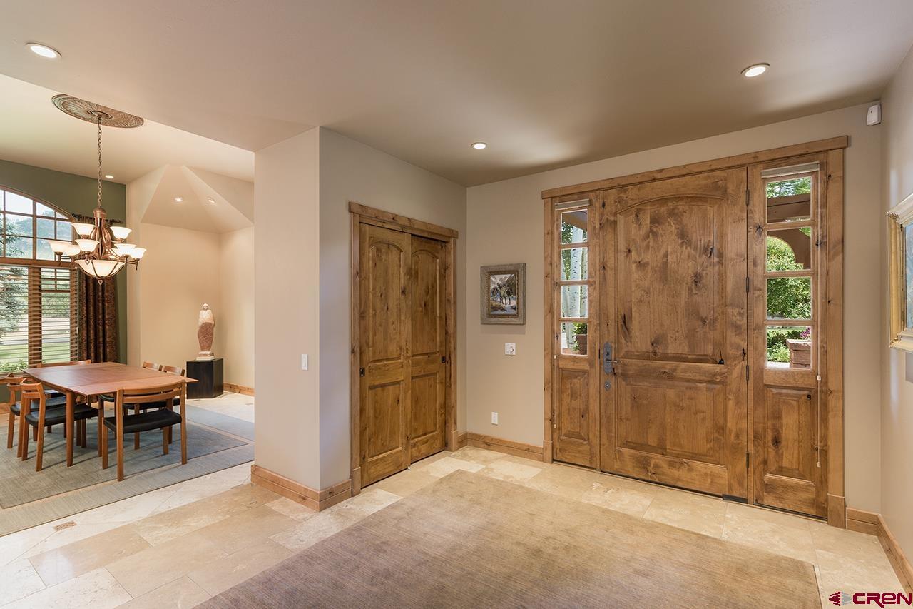 435 Red Rock Road Durango, CO 81301 - Photo 6 of 35 a view of a room with furniture and refrigerator