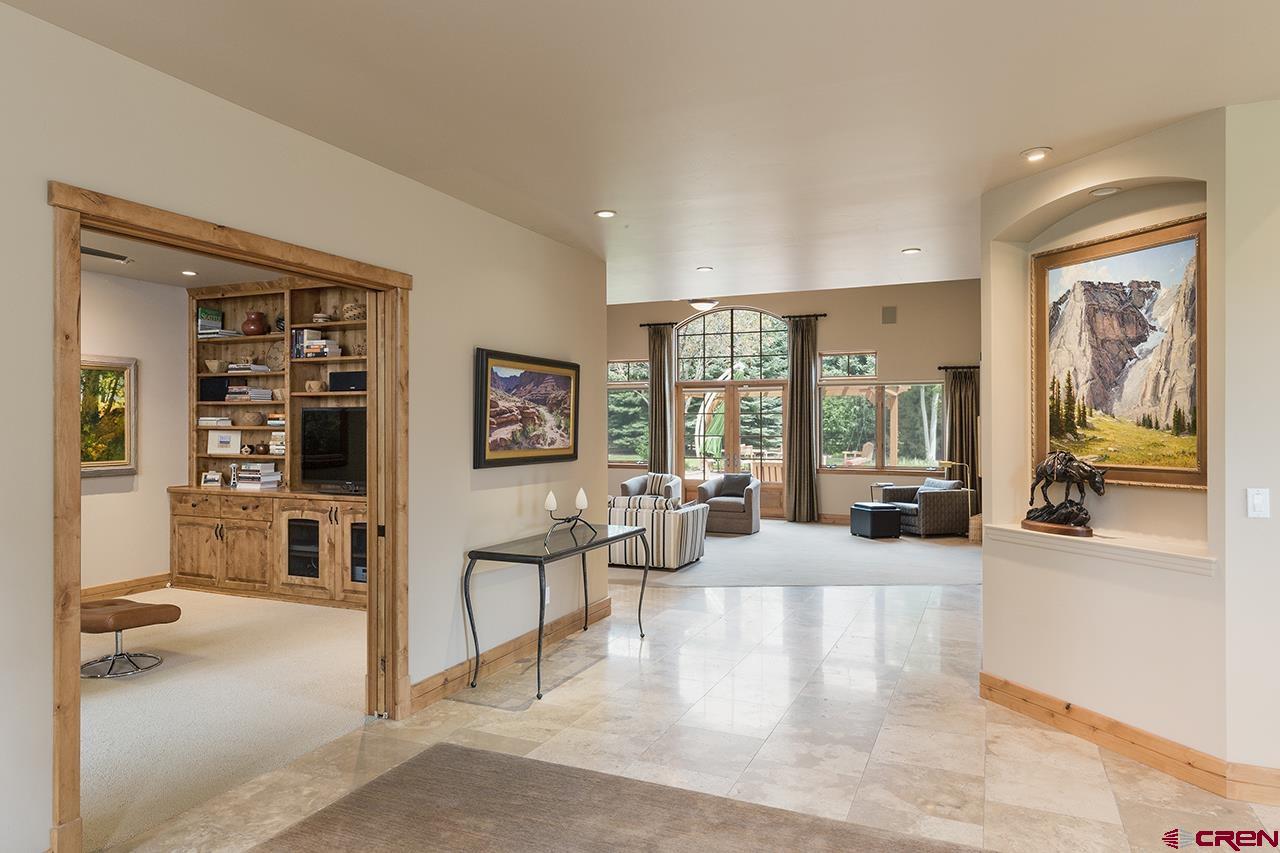 435 Red Rock Road Durango, CO 81301 - Photo 7 of 35 a living room with furniture and large windows