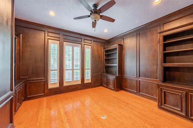a kitchen with stainless steel appliances granite countertop a stove and a refrigerator