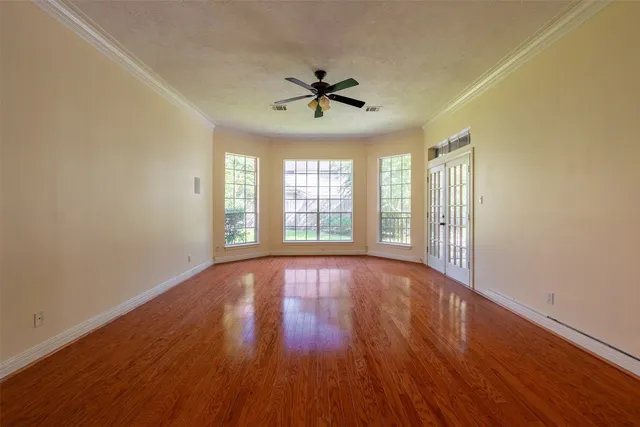 a bathroom with a granite countertop tub sink and mirror