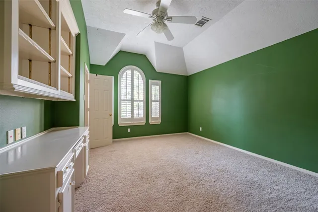 a bathroom with a tub a sink and shower