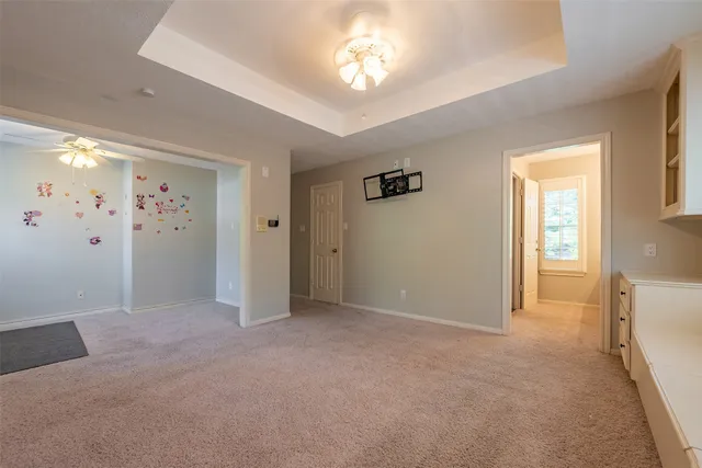 a bathroom with a sink a mirror and a shower