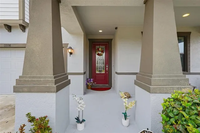 an aerial view of a house with outdoor space