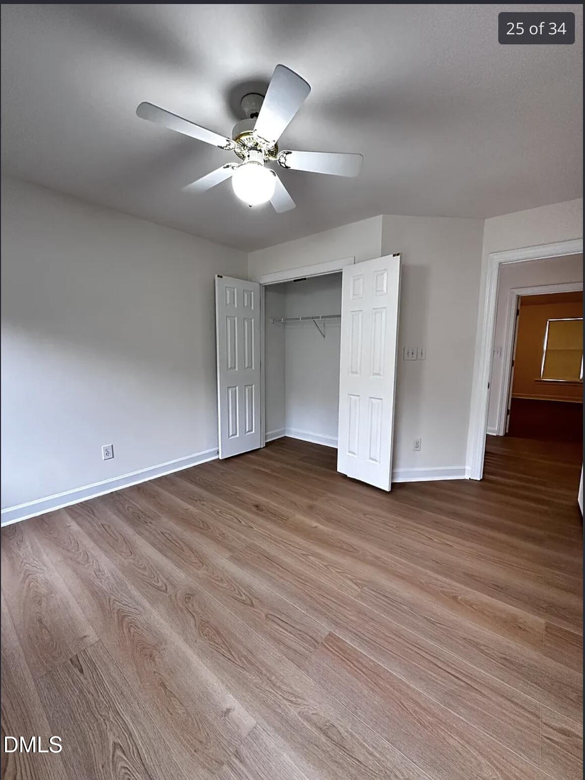 214 Cobble Ridge Drive Chapel Hill, NC 27516 - Photo 20 of 34 a view of empty room with wooden floor