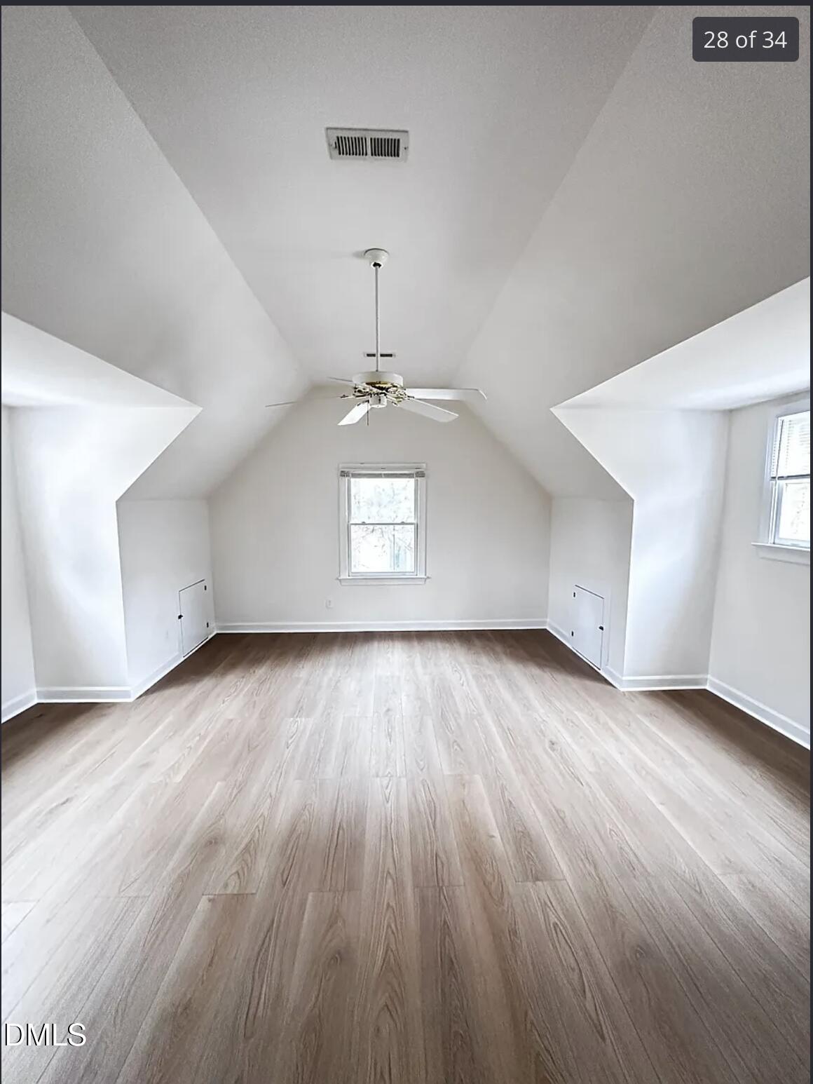 214 Cobble Ridge Drive Chapel Hill, NC 27516 - Photo 29 of 34 wooden floor in an empty room with a window