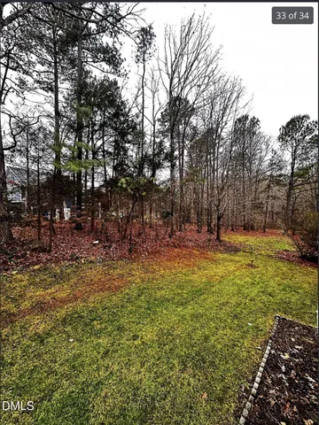 a view of a backyard with a garden