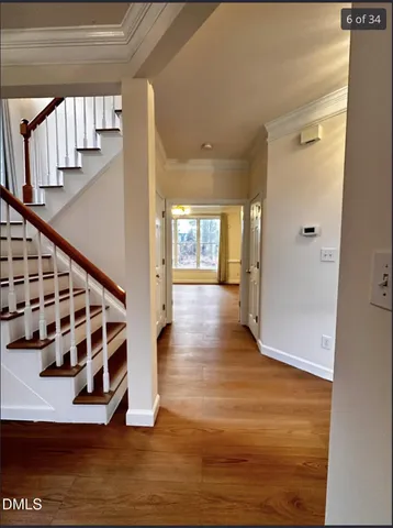 a view of entryway with wooden floor
